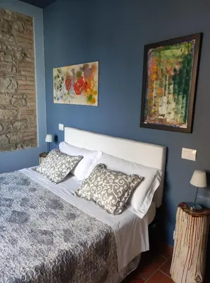 Letto o letti in una camera di B & B Casolara