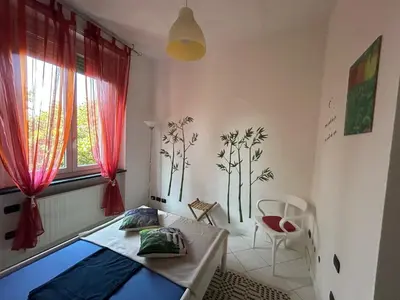 Letto o letti in una camera di Appartamento incantevole a Parma