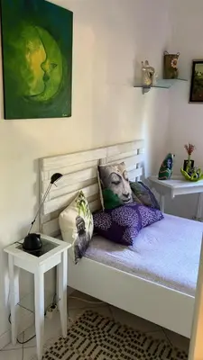 Letto o letti in una camera di Appartamento incantevole a Parma