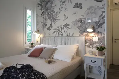 Letto o letti in una camera di Bed & Basta City