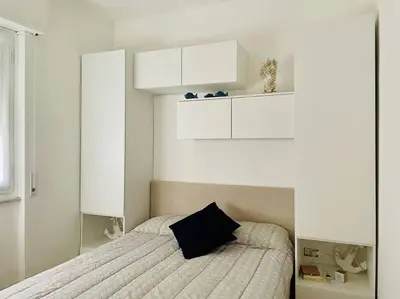 Letto o letti in una camera di Mamidoli apartment, exclusive area in Chiavari