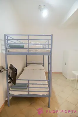 Letto o letti in una camera di FuoriPorta Affitti Brevi - Inzani 8