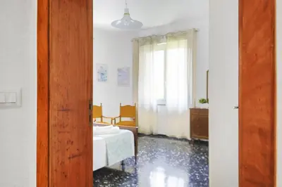 Letto o letti in una camera di Casa Fanni