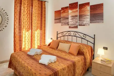 Letto o letti in una camera di Mafalda Apartments