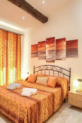 Letto o letti in una camera di Mafalda Apartments