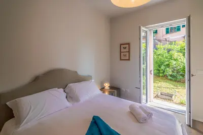 Letto o letti in una camera di CASA BRIGITTE Comfort, Vista e Parcheggio