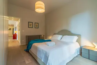 Letto o letti in una camera di CASA BRIGITTE Comfort, Vista e Parcheggio