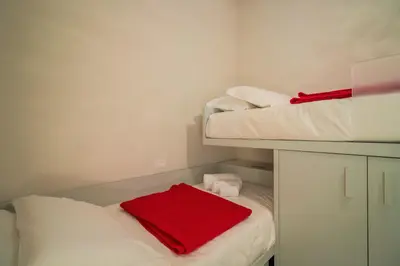 Letto o letti in una camera di CASA BRIGITTE Comfort, Vista e Parcheggio