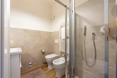 Bagno di JOIVY Lele Apartment with Swimming Pool