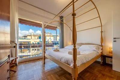 Letto o letti in una camera di SUPER ATTICO Vista Mare e Ampia Terrazza