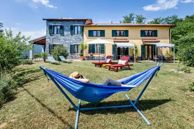 Giardino di Il Laghello Wood House