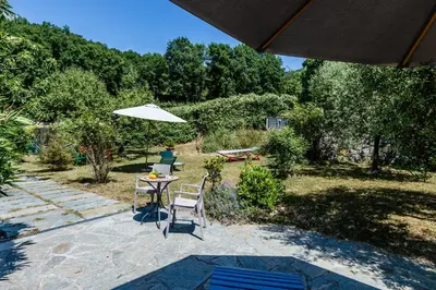 Giardino di Il Laghello Wood House