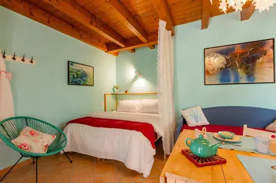 Letto o letti in una camera di Il Laghello Wood House