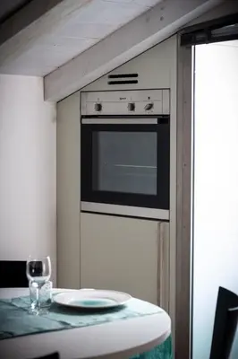 Cucina o angolo cottura di Smeraldo Suite - Smart Holiday