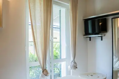 TV o dispositivi per l'intrattenimento presso TIMO - Villa Luisa: con vasca idromassaggio privata