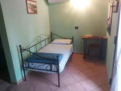 Letto o letti in una camera di B&B La Casa sul Fiume