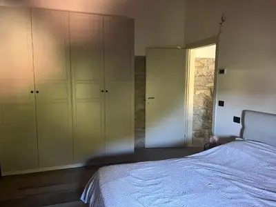 Letto o letti in una camera di Antico Borgo le Roste