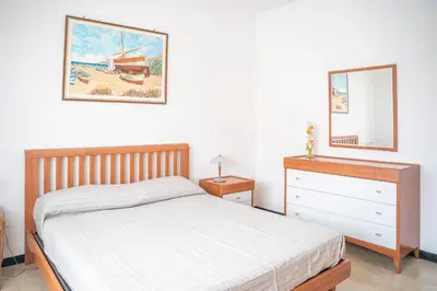 Letto o letti in una camera di Appartamento Corsaro