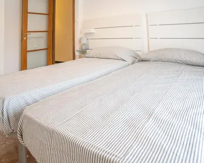 Letto o letti in una camera di Appartamento Corsaro