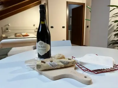 Letto o letti in una camera di Sky Attic a Reggio Emilia