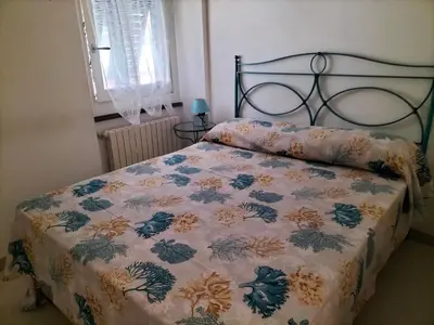 Letto o letti in una camera di CASA BRUNZIN