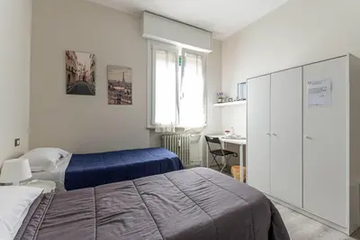 Letto o letti in una camera di FARE BnB - Room del Parco