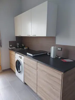 Cucina o angolo cottura di FARE BnB - Room del Parco