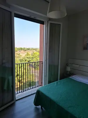 Letto o letti in una camera di FARE BnB - Room del Parco