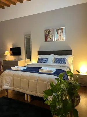 Letto o letti in una camera di Domus San Martino GuestHouse