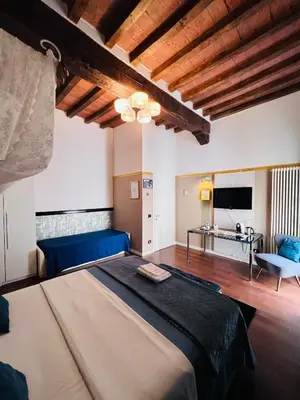 Letto o letti in una camera di Domus San Martino GuestHouse