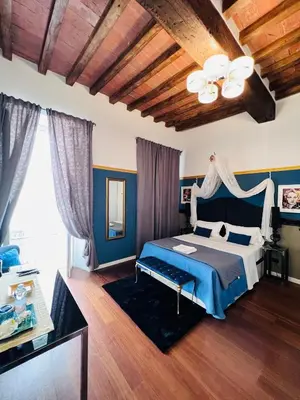 Letto o letti in una camera di Domus San Martino GuestHouse