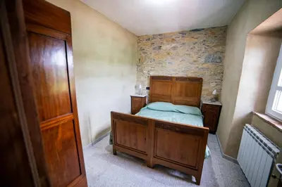 Letto o letti in una camera di Il podere di Emore - Locazione turistica