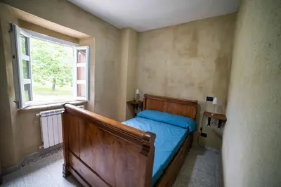 Letto o letti in una camera di Il podere di Emore - Locazione turistica