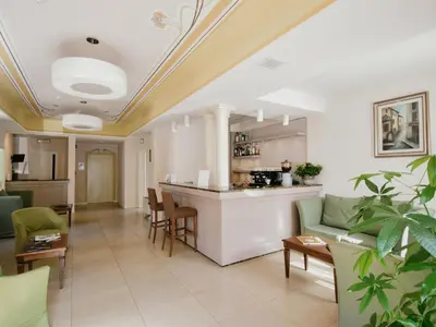 Cucina o angolo cottura di Cora Hotels Leon d'Oro