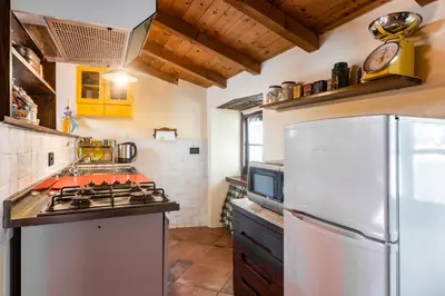 Cucina o angolo cottura di GuestHost - Nearby 5 Terre Lovely Mansarda