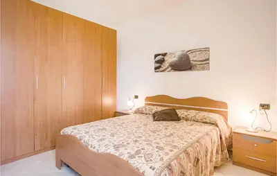 Letto o letti in una camera di Casa Del Papavero