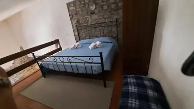 Letto o letti in una camera di La Casetta