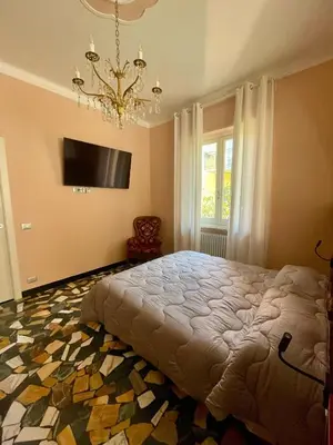 Letto o letti in una camera di 051 - Villa Genny Appartamento Agrumi