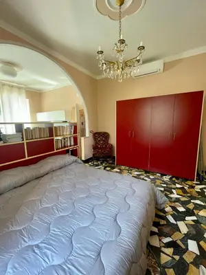 Letto o letti in una camera di 051 - Villa Genny Appartamento Agrumi