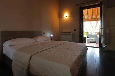 Letto o letti in una camera di B&B Cascina Quaderna