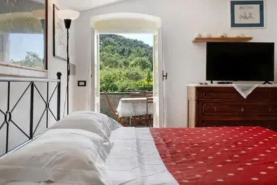 Letto o letti in una camera di Vecchio Mulino Fontona Girasole