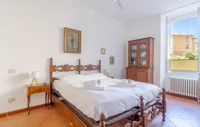 Letto o letti in una camera di Casa Platone