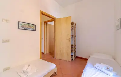 Letto o letti in una camera di Casa Platone