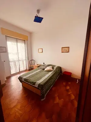 Letto o letti in una camera di Condominio Ulivi