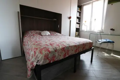 Letto o letti in una camera di Una Conchiglia sul Mare Attico vista Portofino