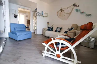 Area soggiorno di Una Conchiglia sul Mare Attico vista Portofino