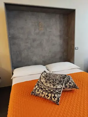 Letto o letti in una camera di Nido al Mare