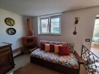 Letto o letti in una camera di CASA GAIA - Limoncello - parcheggio privato incluso