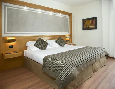 Letto o letti in una camera di Hotel President