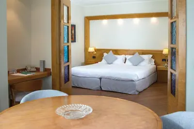 Letto o letti in una camera di Hotel President